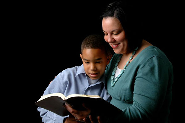 mother reading with son